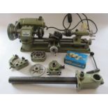 An Emco Unimat SL lathe with instructions, original boxes,