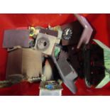 A box of 20th Century cuckoo clock parts and spares