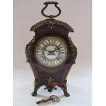 A 19th Century French tortoiseshell mantel clock,