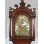 A mid to late 18th Century oak longcase clock with brass arched 12" dial signed William Rayment,