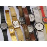 Eight assorted quartz and mechanical wristwatches including Tissot and Swatch,