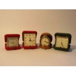 Three Swiza leather cased folding travel alarm clocks and a Keinzle example (4)