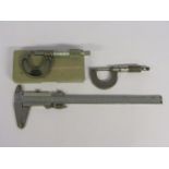 A Mitutoyo steel vernier and two micrometers by NSK Japan and Brown & Sharpe,