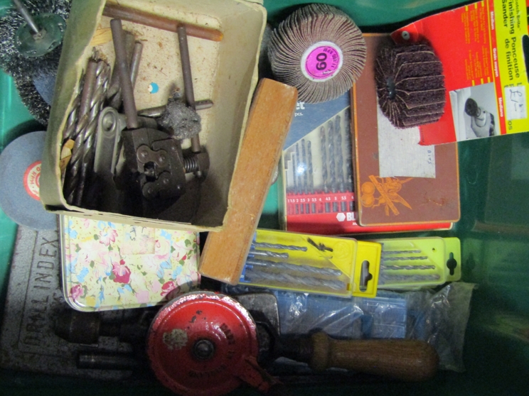 A box of mixed size drill bits and drill attachments, Allen keys,