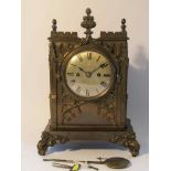 An early Victorian Gothic revival bracket clock in cast metal architectural case (some small