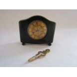 A late 19th Century movement from a lady's fob watch, re-housed in a miniature bakelite case,