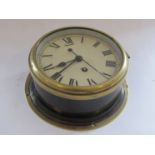 An early 20th Century ship's clock with Roman dial and centre seconds, case 9.