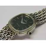 OMEGA: a De Ville silver cased lady's manual wind bracelet watch with cabochon set crown,