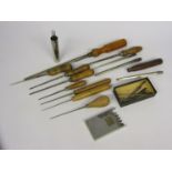 An assortment of cutting and smoothing broaches of mixed size,