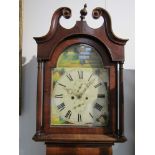 An early 19th Century mahogany longcase clock, painted arched 12" dial signed David Steven,