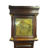An early to mid 18th Century oak longcase clock with 11" square brass dial signed John Edwards,