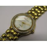 A Maurice Lacroix gold plated lady's quartz bracelet watch with mother of pearl dial,