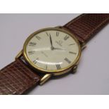 OMEGA: a De Ville gold plated and steel cased gent's manual wind wristwatch, Roman dial,