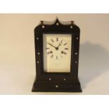 A 19th Century French ebonised mantel clock, enamelled Roman dial (a/f) signed Les Japy Fils, Paris,