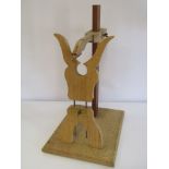 A handbuilt wooden longcase testing stand and a French pendulum clock testing stand (2)