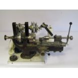 A Patrick 8mm watchmaker's lathe with Pultra compound slide, drilling tailstock,