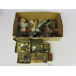A box of mixed pocket and wristwatch movements, cases,