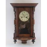A Thomas Haller regulator style wall clock with musical hourly strike with music box and cylinder,
