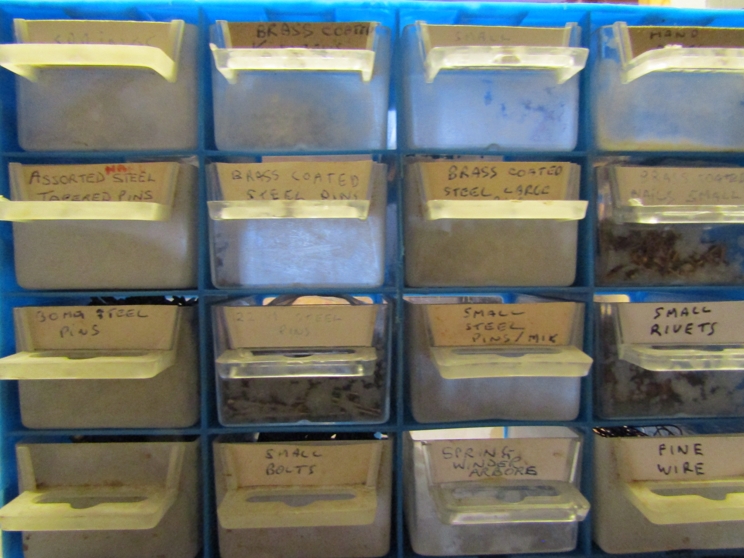 Three workshop drawer cabinets and various clock parts and consumables including clicks, - Image 2 of 7