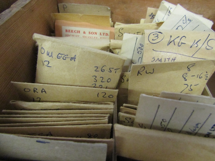 Two drawers containing a large quantity of watch balance staffs, stems, - Image 4 of 4