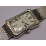 TISSOT: a silver cased manual wind gent's bracelet watch of Art Deco influence,