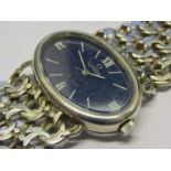 OMEGA: a De Ville silver cased lady's manual wind bracelet watch with suede Omega pouch,