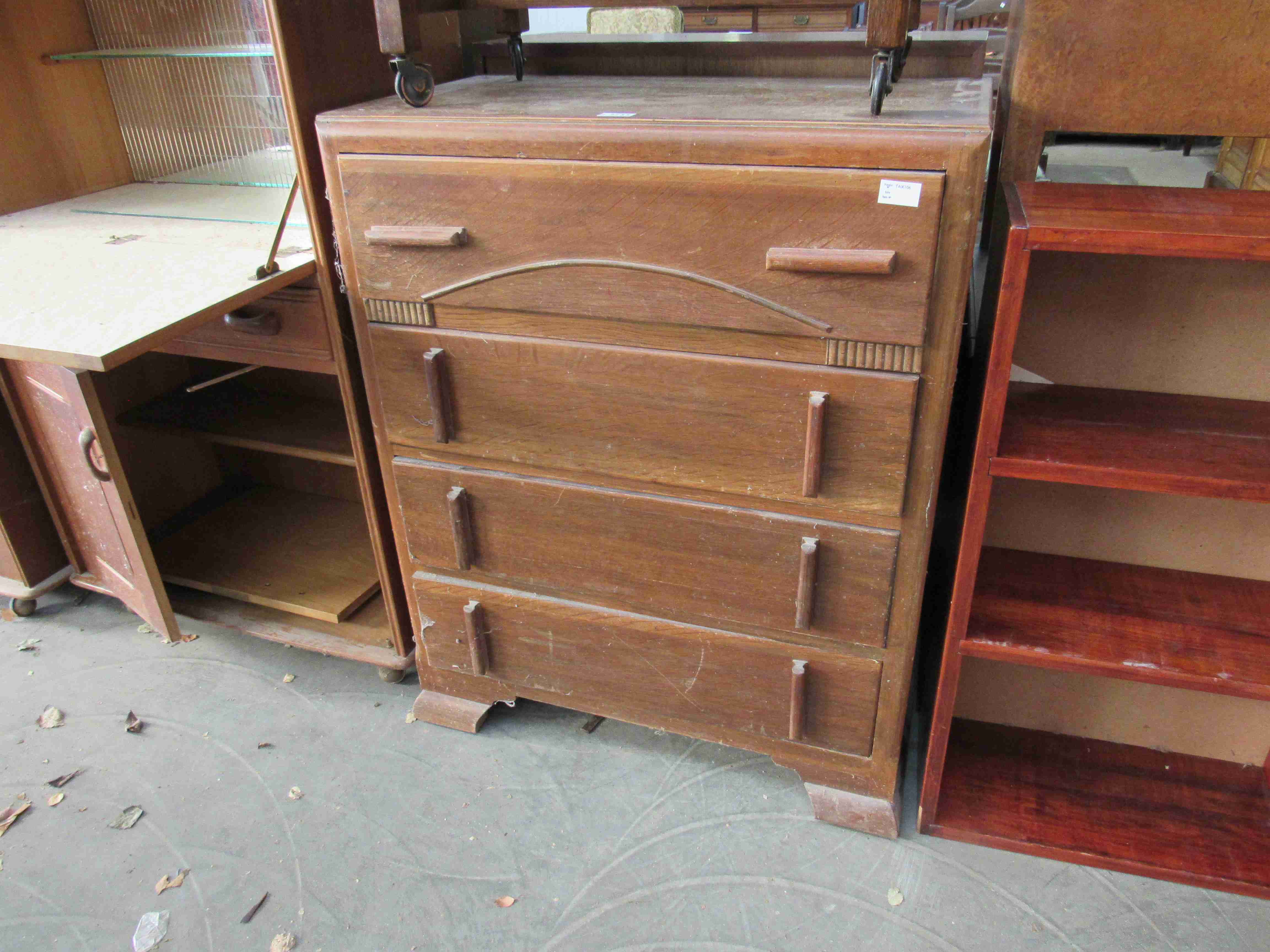 A 1940's oak chest of four drawers