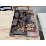 A tray of bygone carpenters tools
