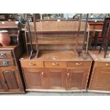 An Ercol Quaker oak sideboard dresser