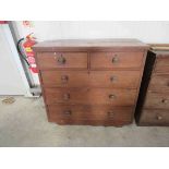 A Victorian mahogany two over three chest of drawers