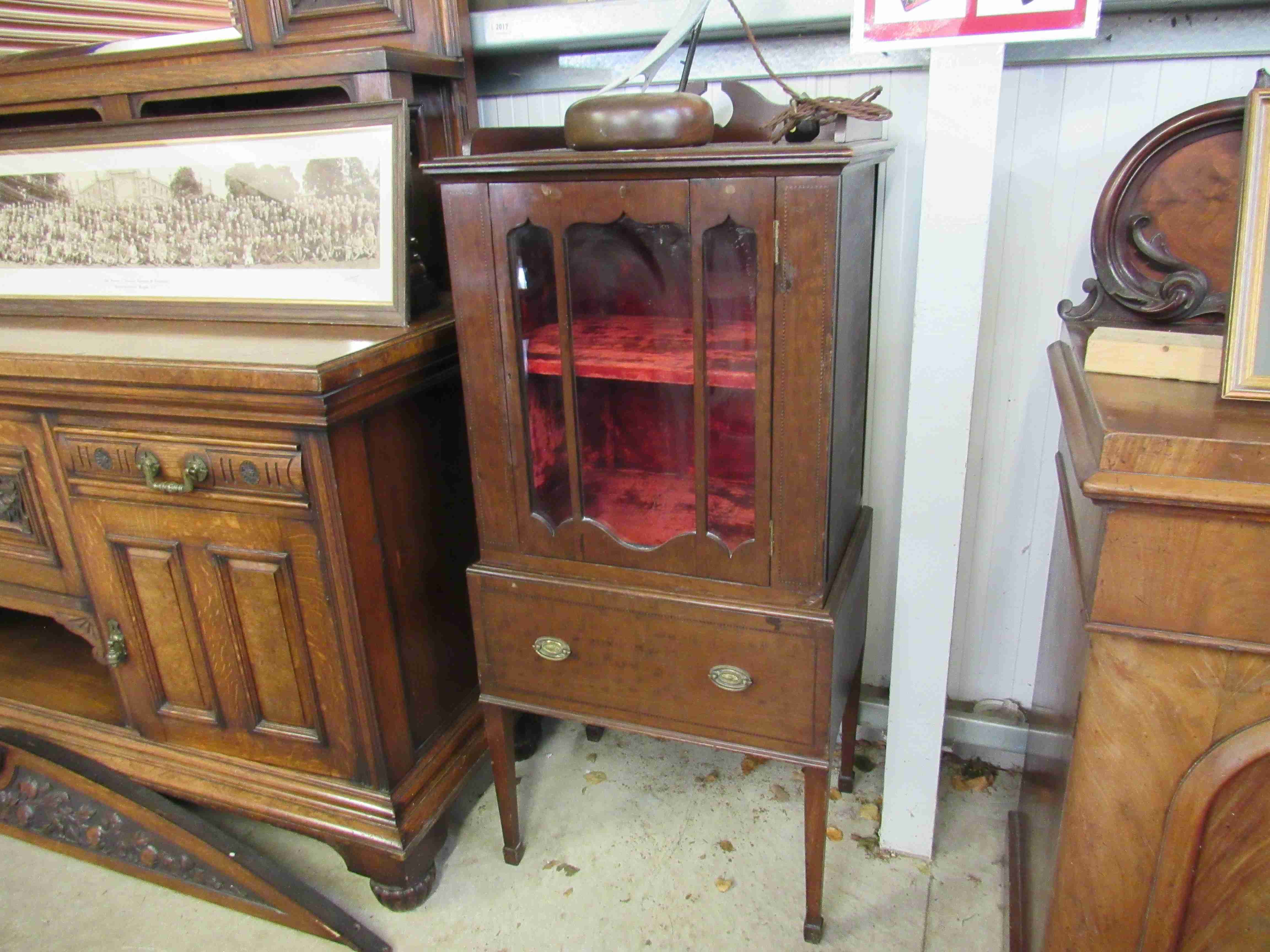 An Edwardian inlaid mahogany display cabinet with side drawer