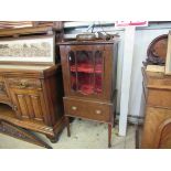 An Edwardian inlaid mahogany display cabinet with side drawer