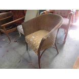 A Lloyd Loom Lusty tub chair