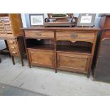 An Edwardian mahogany two drawer,