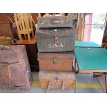 Three Victorian tin trunks and a small case