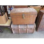 A Victorian canvas covered travel case and a tin trunk