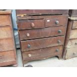 A Victorian mahogany two over three chest of drawers