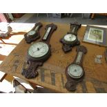 Four 1930's carved oak barometers for restoration