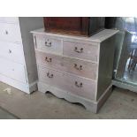 A painted Victorian pine two over two chest of drawers, modern brass handles,