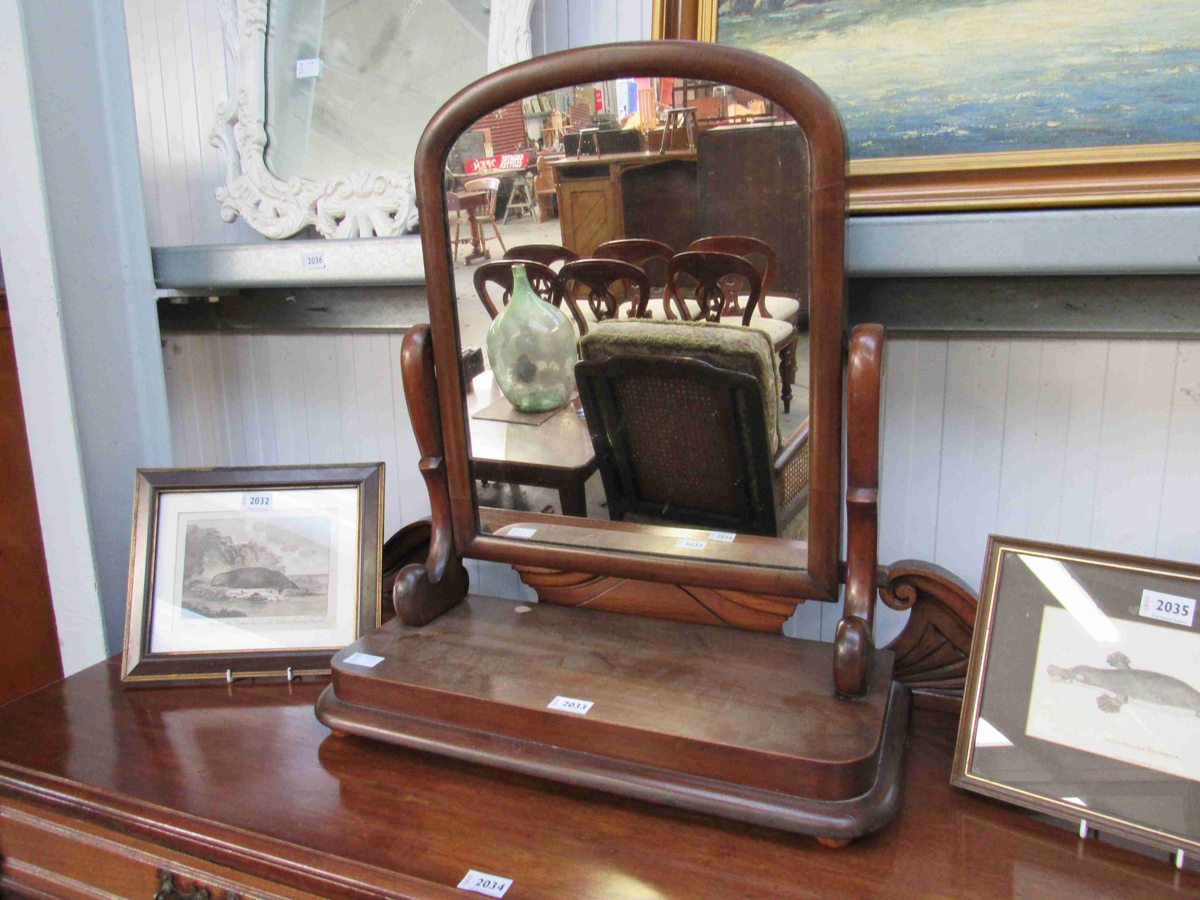 A Victorian mahogany toilet swing mirror