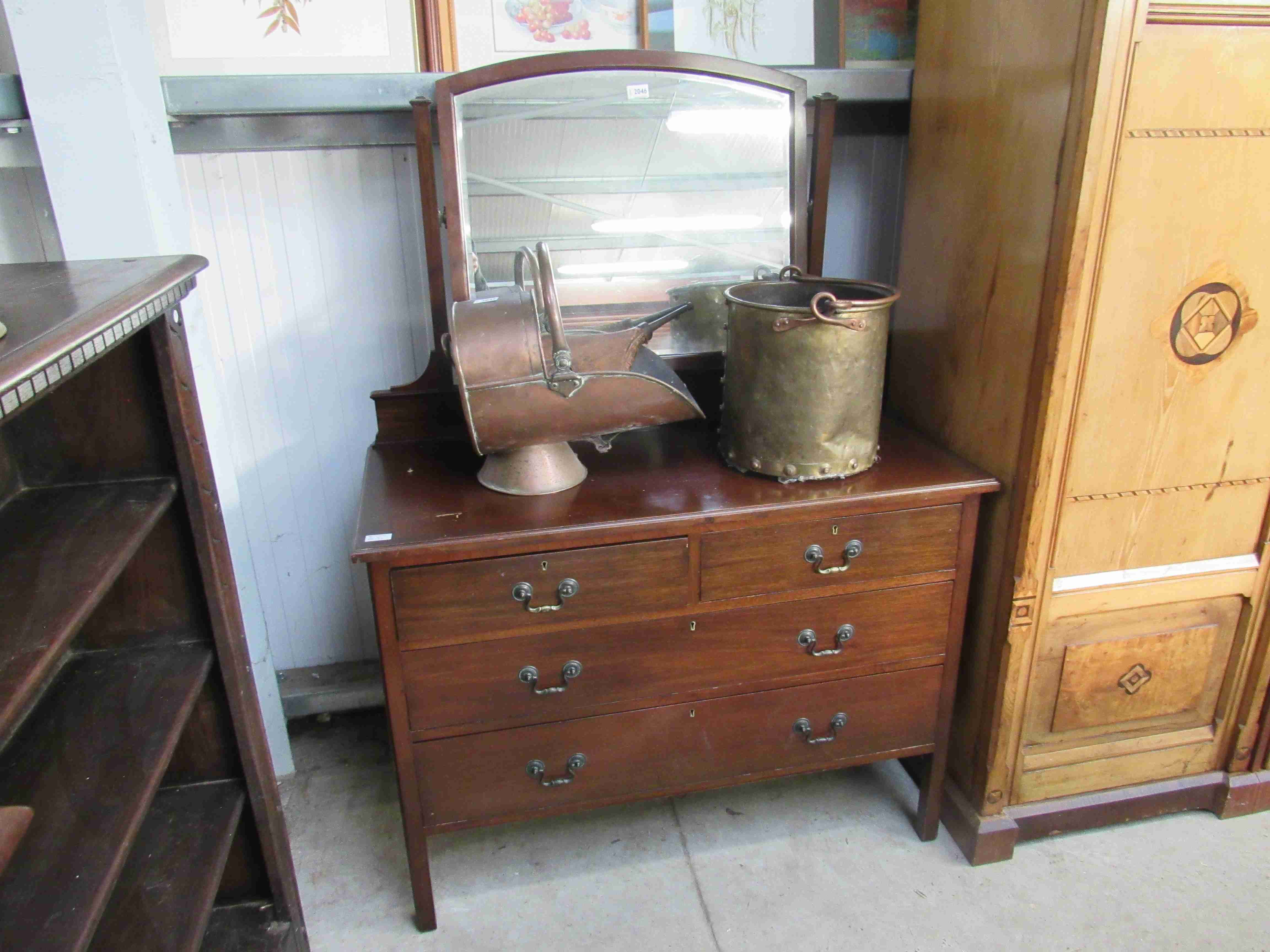 A 1930's mahogany dressing chest of four drawers