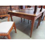 A 19th Century provincial French cherry wood two drawer kitchen table,