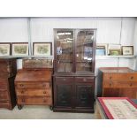 A Victorian carved mahogany bookcase,