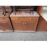 An Ercol Quaker oak sideboard