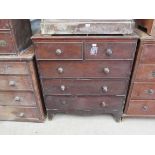 A Victorian mahogany two over three chest of drawers