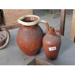 Two terracotta jugs