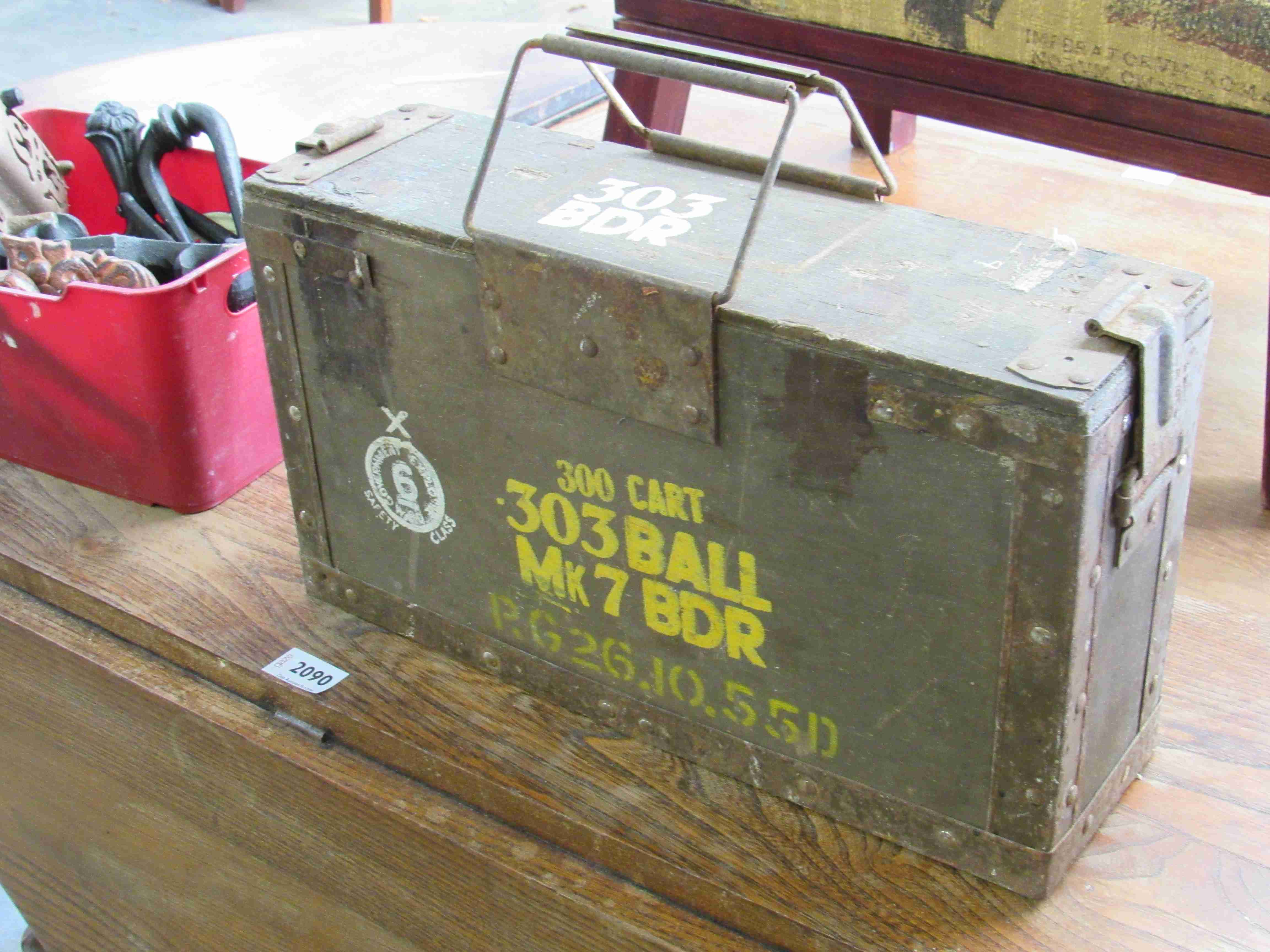 An ammo box and mixed metal wares,