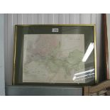 A gilt framed 19th Century map of the Known World, hand coloured by A.C.