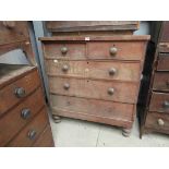 A Victorian mahogany two over three chest of drawers