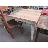 A modern kitchen table, waxed top,